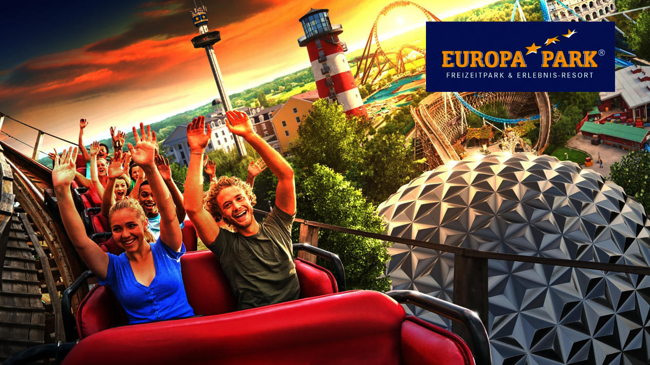 Menschen in einem Achterbahnwagen schreien vor Freude und Nervenkitzel während einer steilen Abfahrt auf der rotgestützten Bahn „Huracan“ im Freizeitpark Belantis.